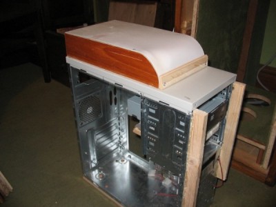 Ducting on top of case for expelled air.
